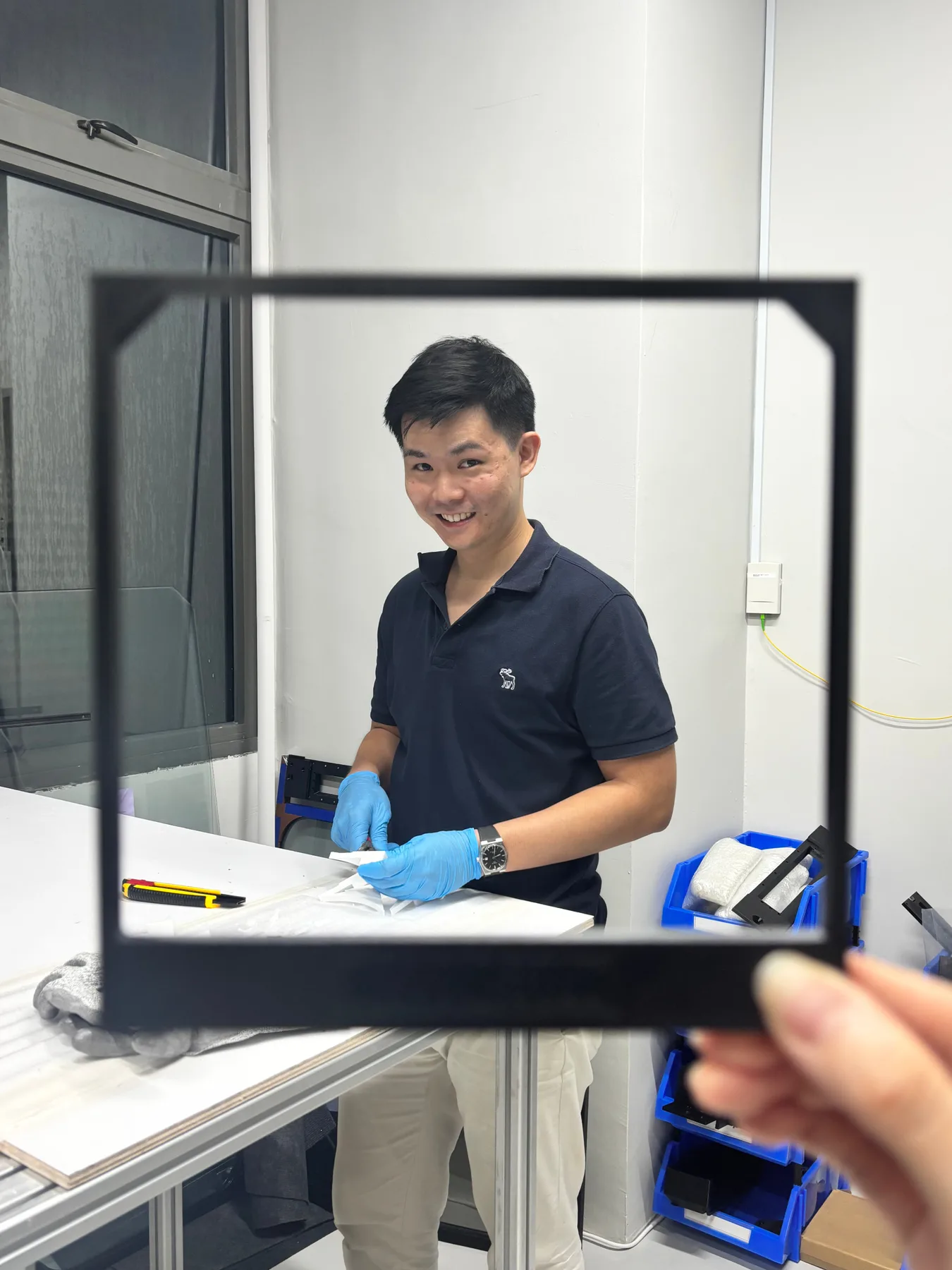 Windee founder Tze Liang holding an AireeFit frame